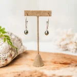 Silver earrings with oval semi-open setting and Tahitian pearls