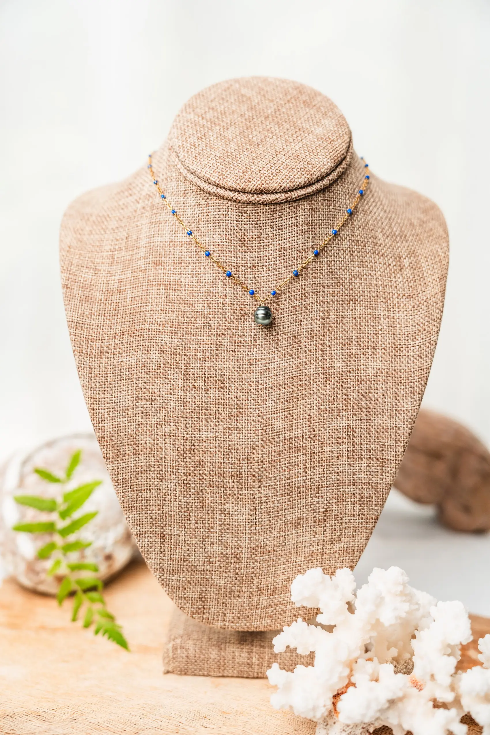 Simple Tahitian pearl necklace with gold chain and blue balls